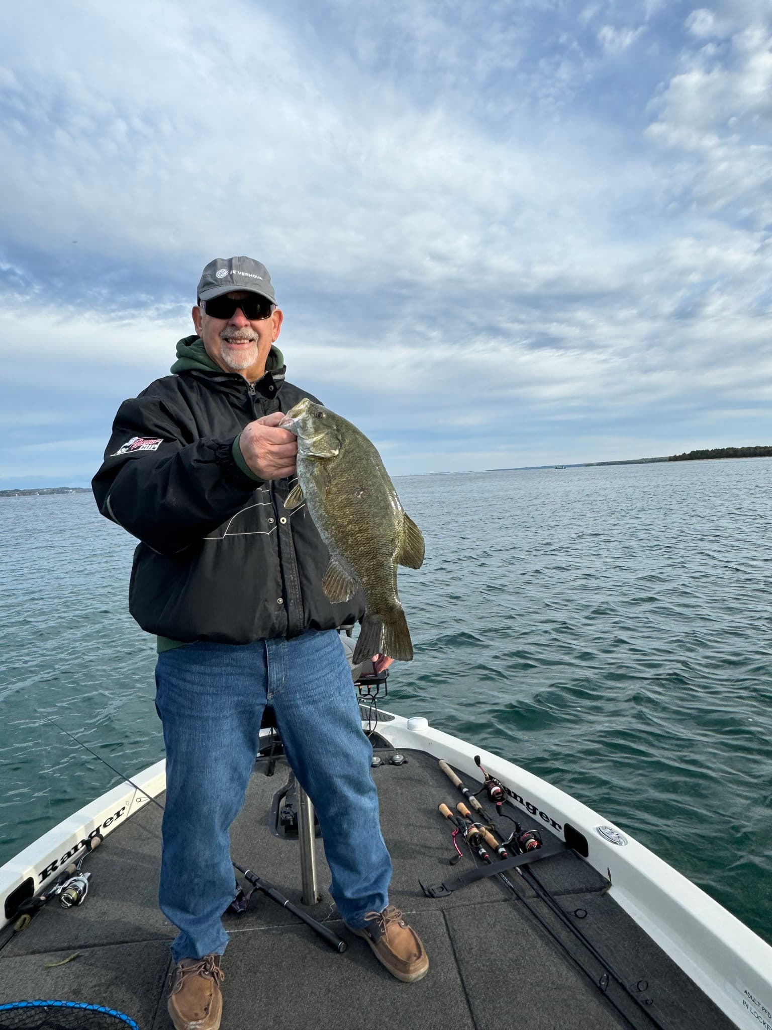 Captain on the boat with beautiful sky